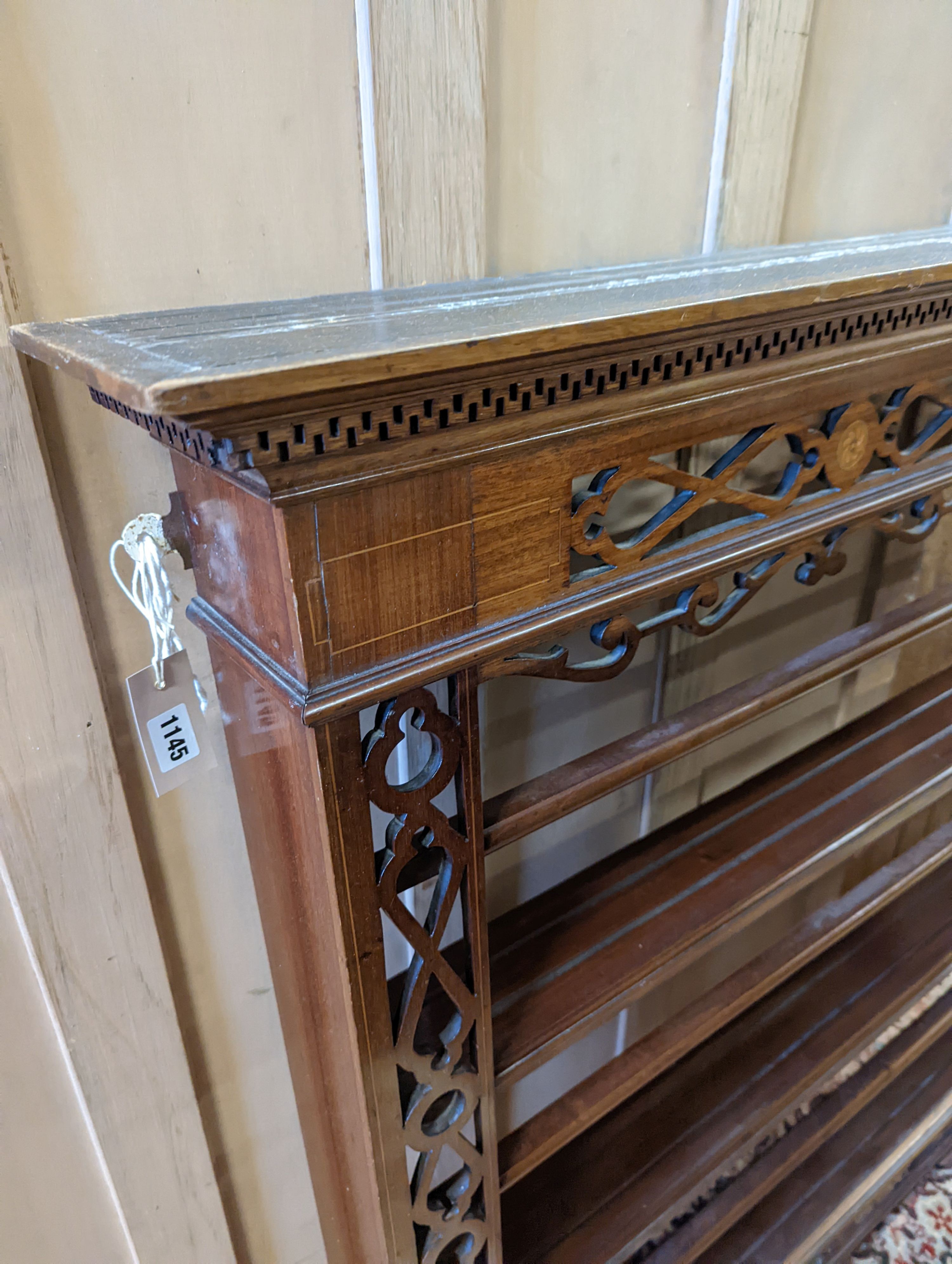A George III style inlaid mahogany plate rack, width 135cm, depth 17cm, height 119cm